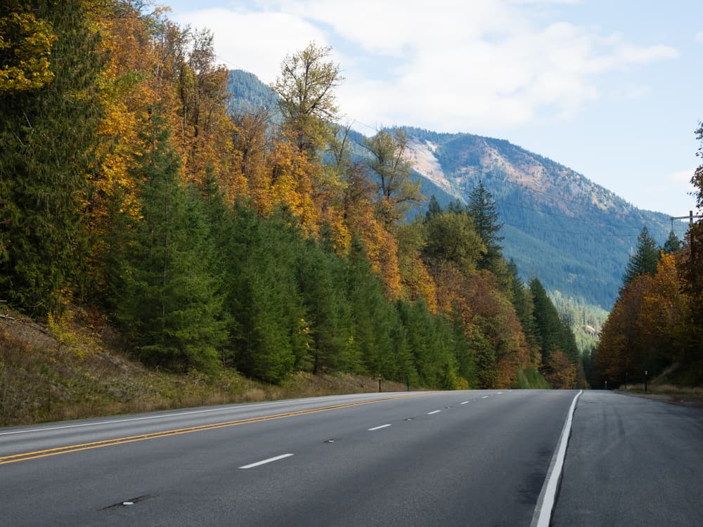 Autumn view of U.S. Route 2 Highway, part of Cascade Loop Scenic Drive, in Washington state, USA